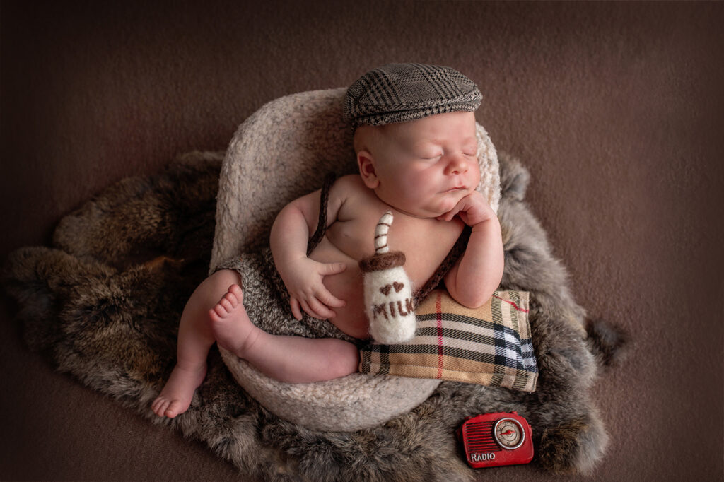 Sleeping newborn baby photographed by a baby milestone photographer in San Ramon