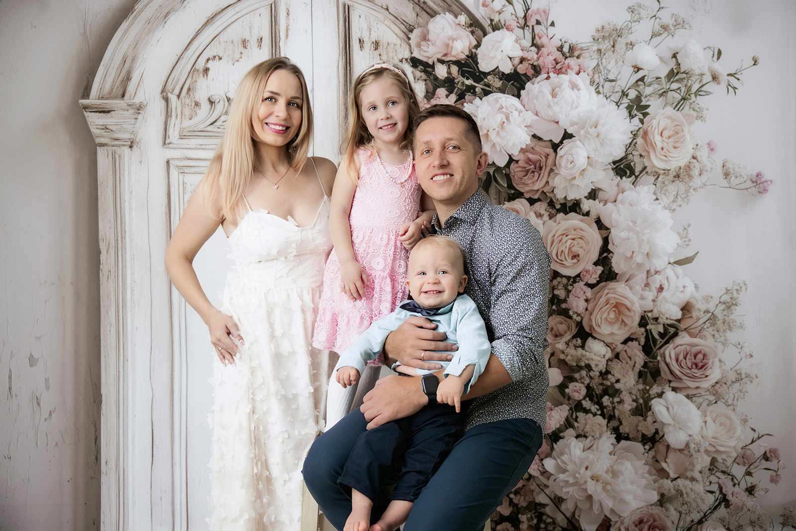 Family of four posing together during a family photography session in San Ramon, CA | FrameIt Bay Area.