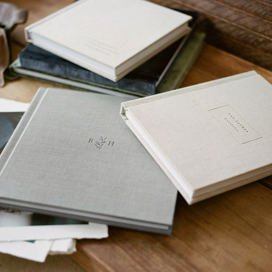 Luxury heirloom photo albums in neutral fabric covers