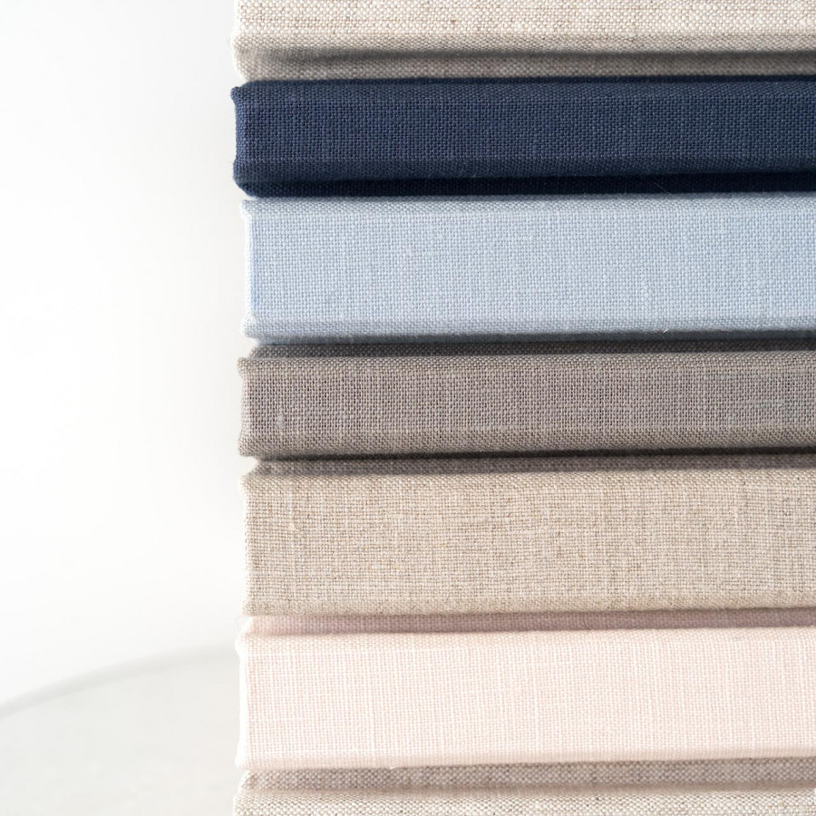 Heirloom photo album covers in neutral fabric colors
