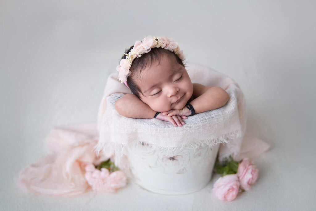 Sleeping newborn during the best time of day for newborn photos in a San Ramon photography studio.