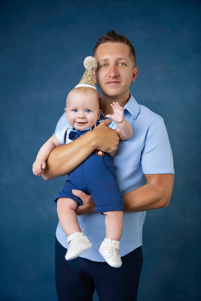 baby milestone photos at six months with his father