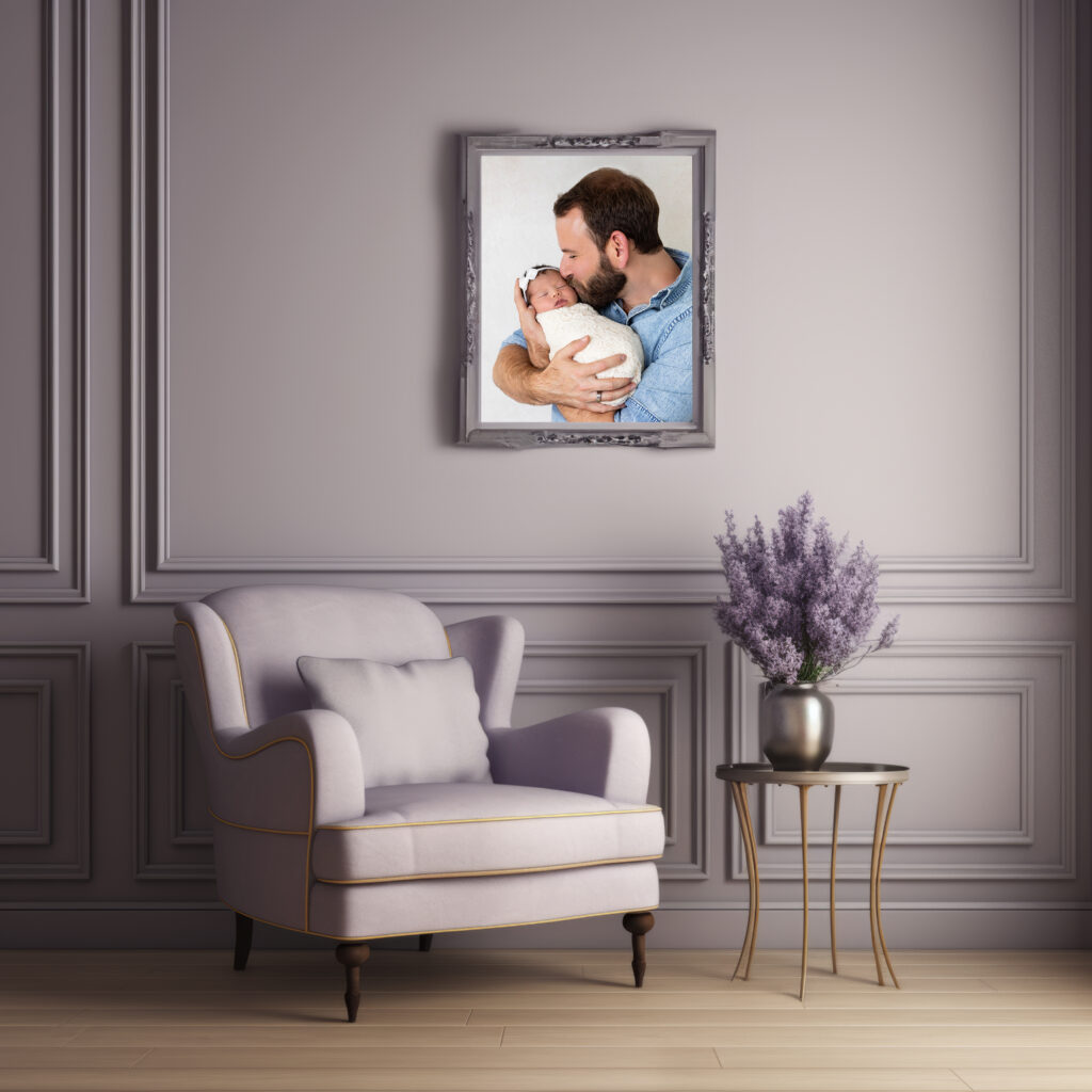 Family photo wall featuring framed family portraits in a nursery