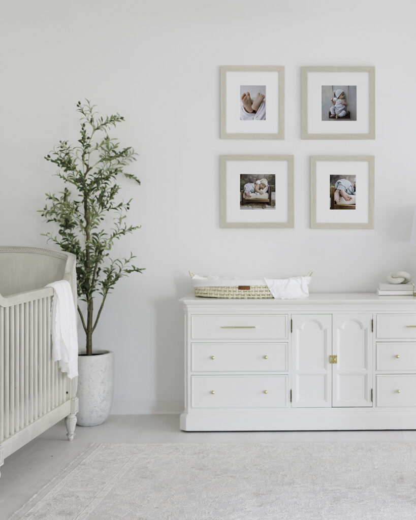Newborn photography wall art displayed in a nursery